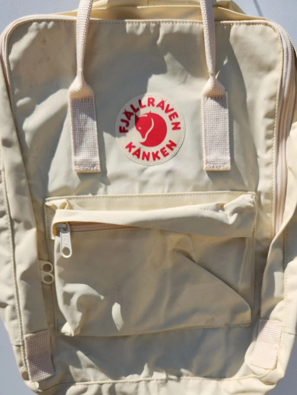 Fjallraven Kanken Backpack in Cream with Red Logo Patch